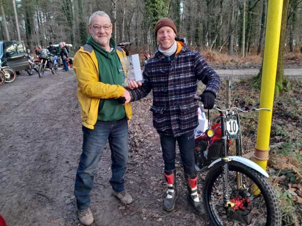 Vice Chairman Tom Welch presents Kurt Brain with his winner's award for the Brian Valder Charity Trial. Pic: Simon Welch Vice Chairman Tom Welch presents Kurt Brain with his winner's award for the Brian Valder Charity Trial