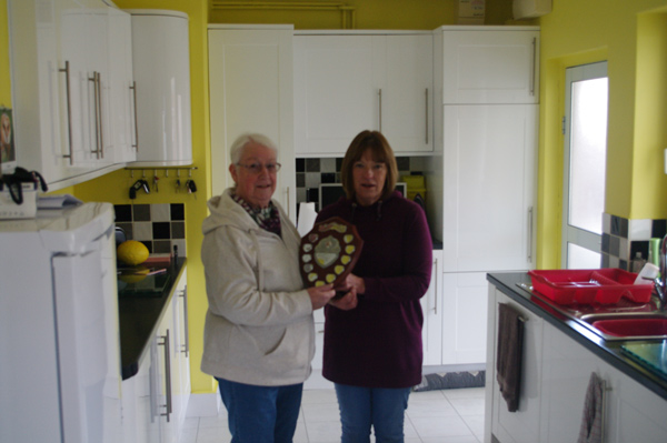 Sally Palmer (R) receives the Dick Wyatt Award from Jennie Jones. Pic: Dave Burry
